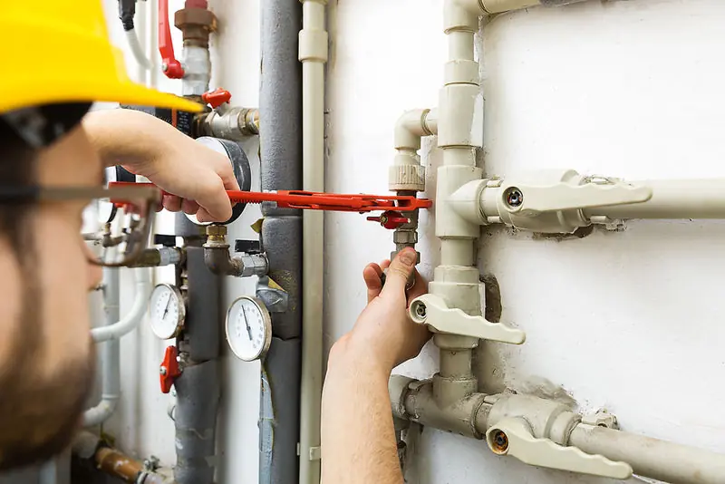 Plumbing job in progress by QA Playwright Plumbing in Miami